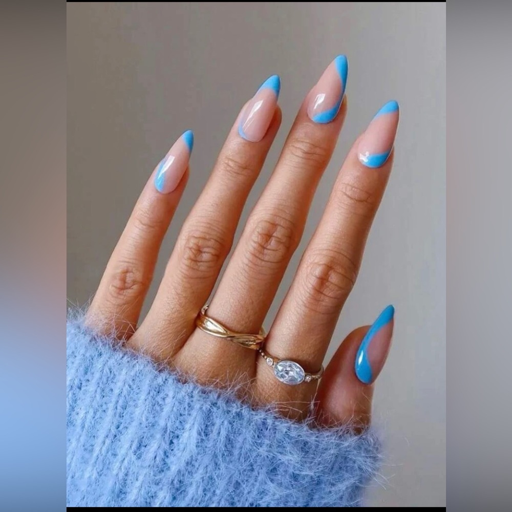 Blue wavy design with neutral pink press on nails. almond shaped fake nails cute
